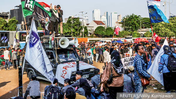     Фото: REUTERS/Willy Kurniawan   
 Текст: Геворг Мирзаян, доцент Финансового университета
