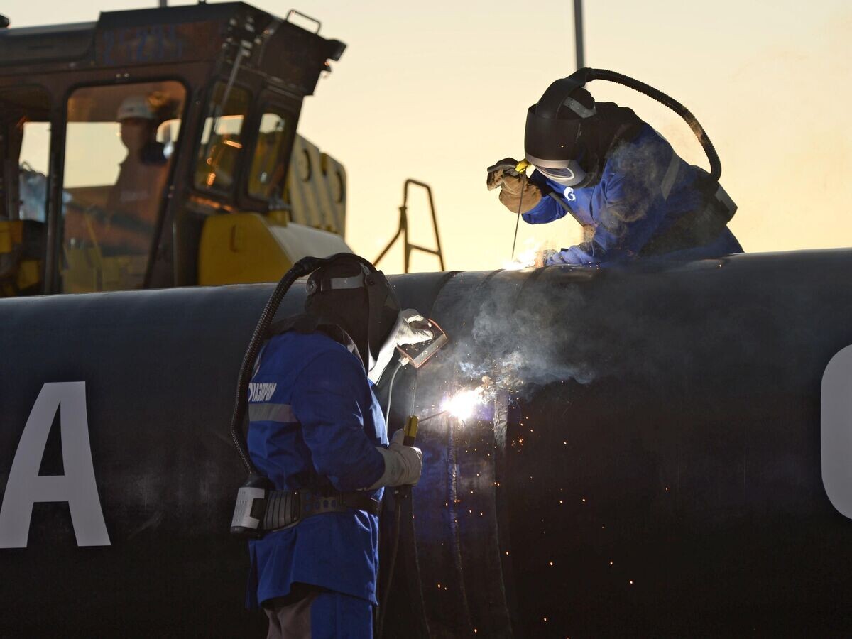    Сварка шва на церемонии соединения первого звена магистрального газопровода "Сила Сибири". 2014 год © РИА Новости / Алексей Никольский