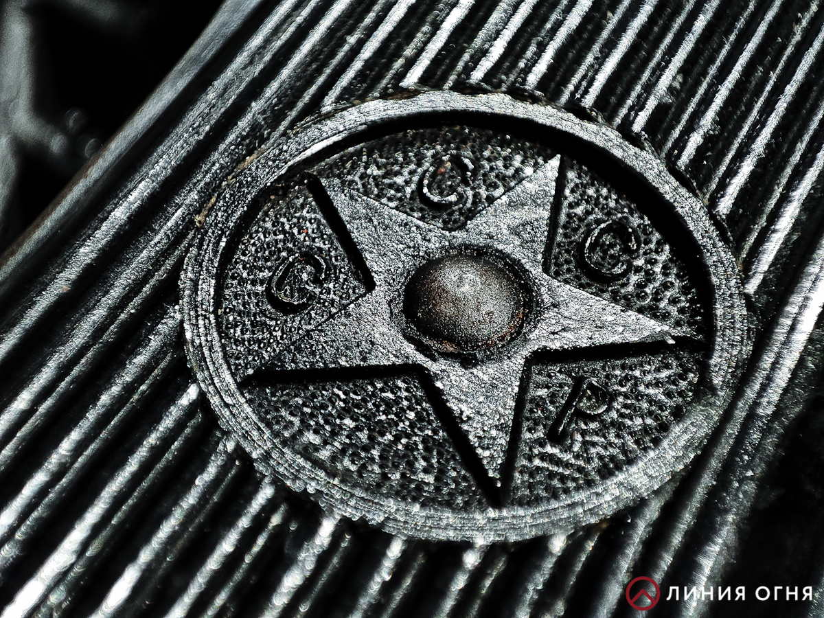 Плашка пистолета крупным планом.