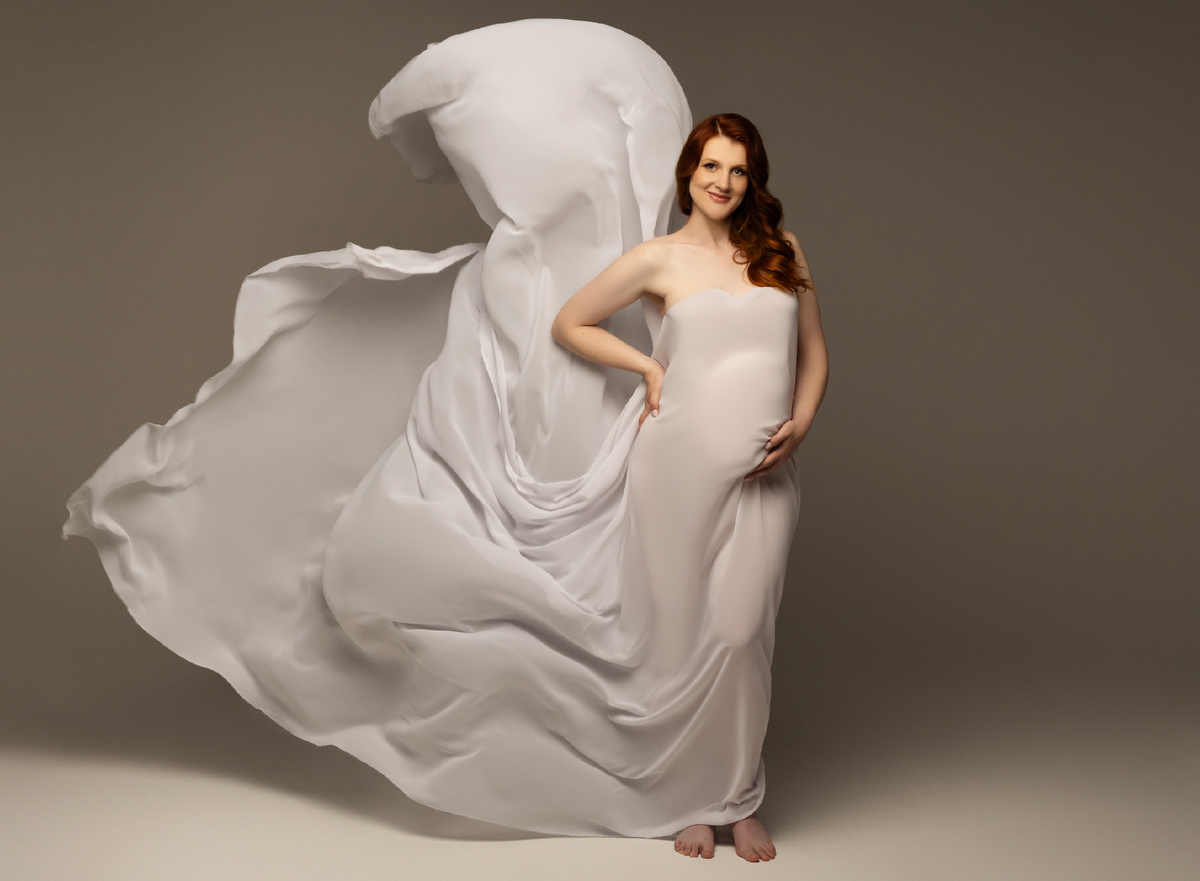 фотосессия берменности в летающих тканях