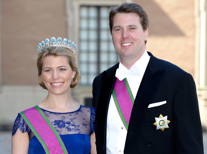 Принц Хубертус Саксен-Кобург-Готский и его супруга, принцесса Келли, на свадьбе шведской принцессы Мадлен, 8 июня 2013 года