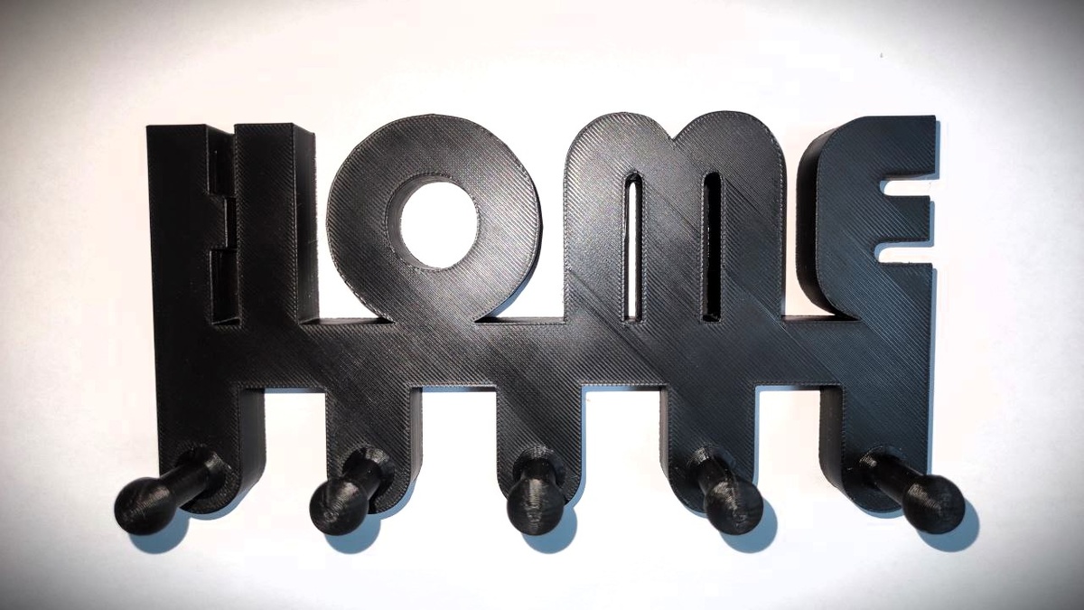 Обработанная модель, но с заметными полосами, особенно на букве m.