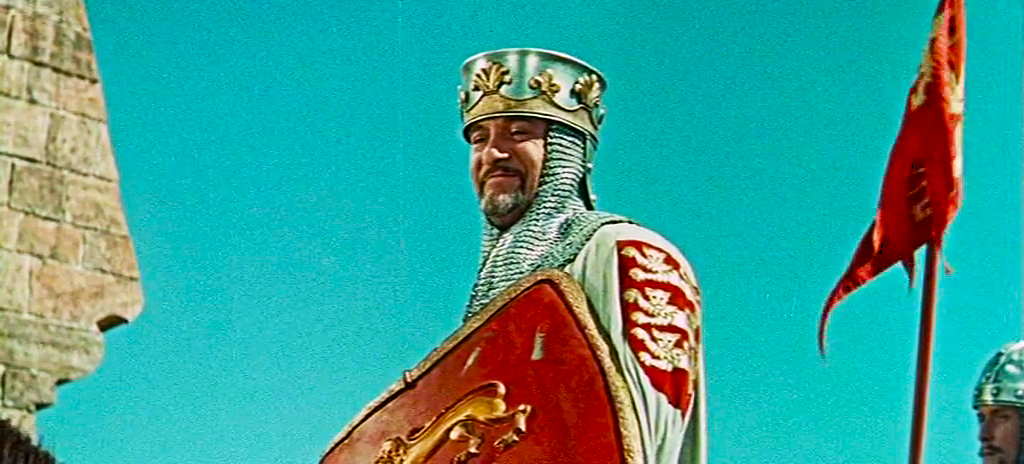 Для подавляющего большинства представителей средневекового исламского мира Ричард Львиное Сердце был деспотичным, жестоким, беспощадным и свирепым правителем, который напрасно, вероломно, с особым цинизмом и кровожадностью предал казни три тысячи правоверных мусульман. Для представителей западноевропейской средневековой цивилизации Ричард I Плантагенет являлся образцом безупречного во всех отношениях короля-рыцаря, отважного и неустрашимого воина, талантливого полководца, харизматичного лидера, сильного и авторитетного государя. Кадры из фильма «Ричард Львиное Сердце» (оригинальное название – «Король Ричард и крестоносцы»; «King Richard and the Crusaders») [1954; производство – США. Режиссёр – Дэвид Батлер. Автор сценария – Джон Твист]. В роли короля Ричарда – британский актёр Джордж Генри Сандерс