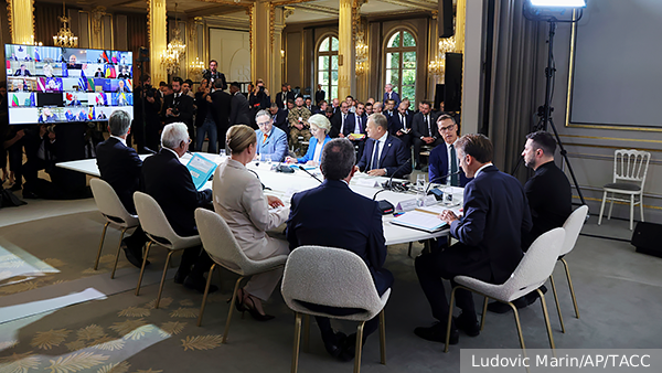     Фото: Ludovic Marin/AP/ТАСС   
 Текст: Дмитрий Зубарев