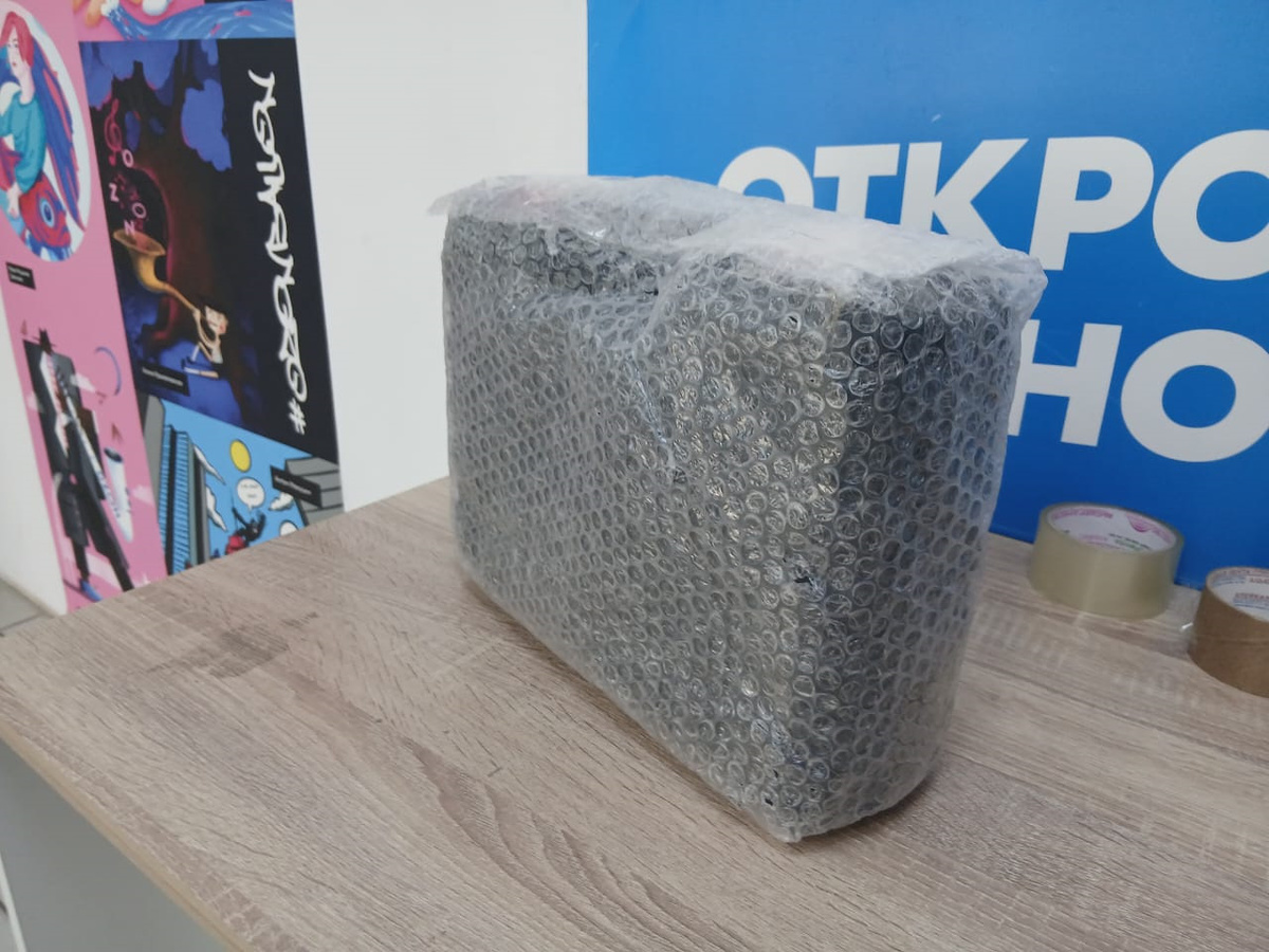 Приходит минимойка надежно упакованной