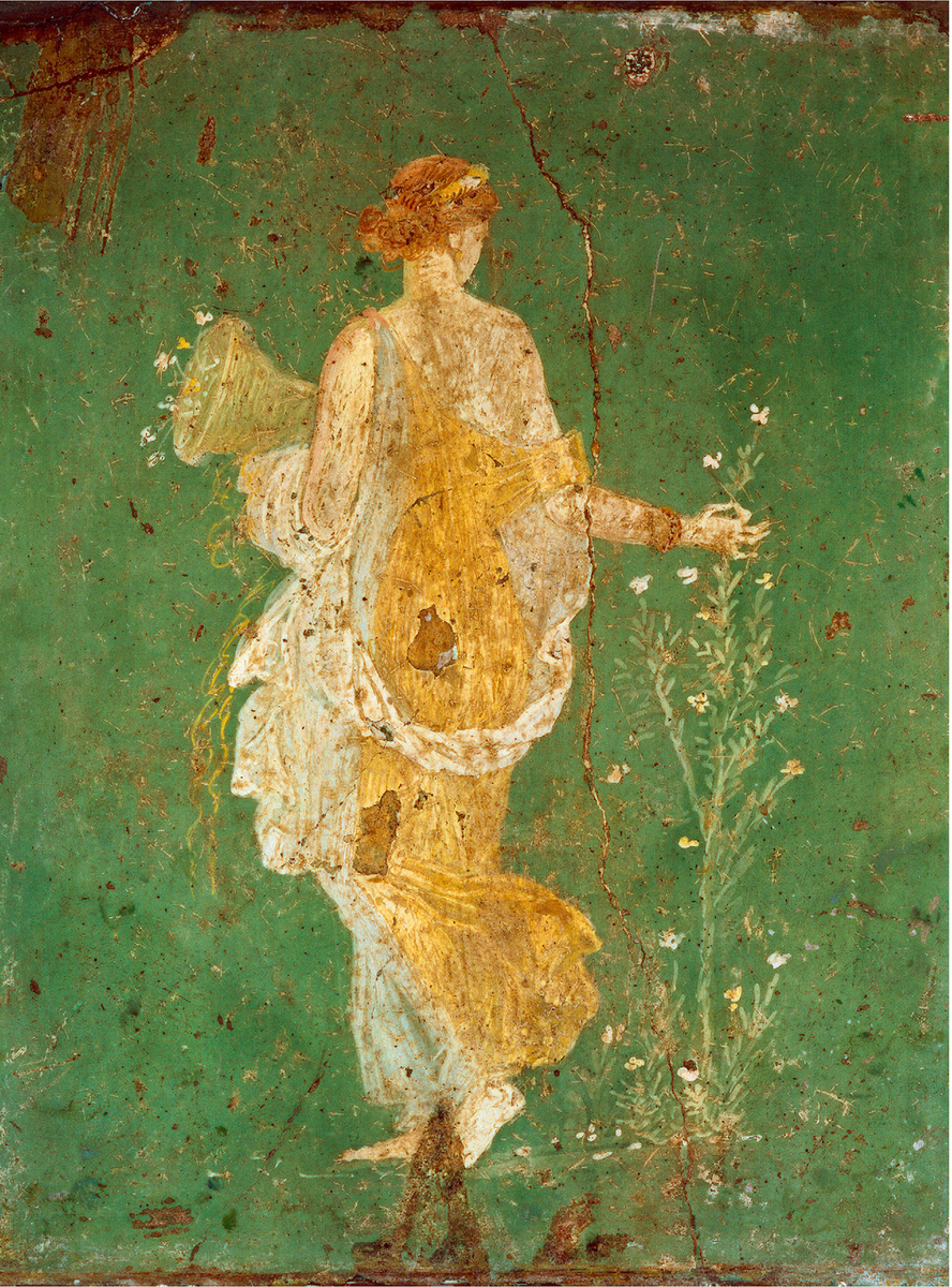 Богиня флоры, цветов и весны
Римляне ценили цветы, но предпочитали выращивать местные сорта, не уделяя особого внимания экзотическим растениям для своих садов. Помимо декоративных целей и украшения частных домов, цветы находили применение в изготовлении венков и корон, а также использовались в медицине, кулинарии и парфюмерии. Поэтические источники указывают, что наиболее любимыми были красные, белые и желтые цветы, в то время как синие и фиолетовые ценились меньше. В честь богини цветения Флоры проводились весенние игры и празднества, известные как Флоралии.
Фреска найдена в Villa Ariane на склоне холма Варано недалеко от Стабиае, I век н. э. Неаполь, Музей археологии Национале.