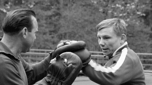 Станислав Иванович с тренером 