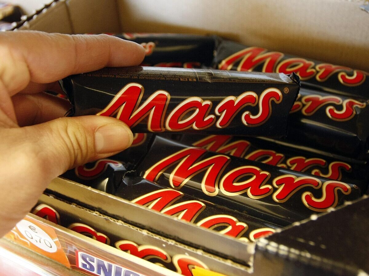    Шоколадные батончики компании Mars© AP Photo / MARTIN MEISSNER