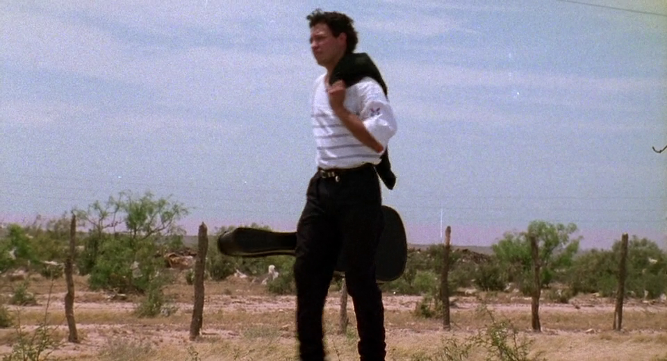 Кадр из фильма "Музыкант" (1993)