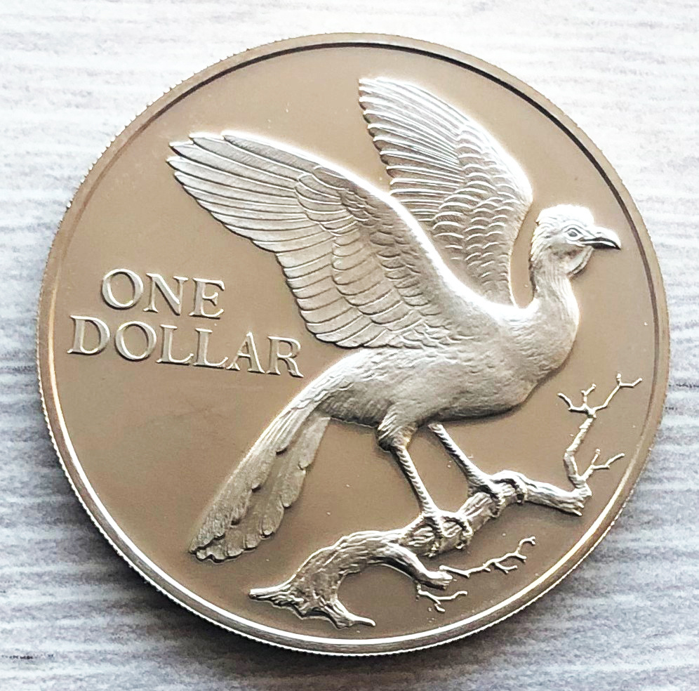 Тринидад и Тобаго 1 доллар 1976 Краснохвостая Чачалака. Фото автора. 