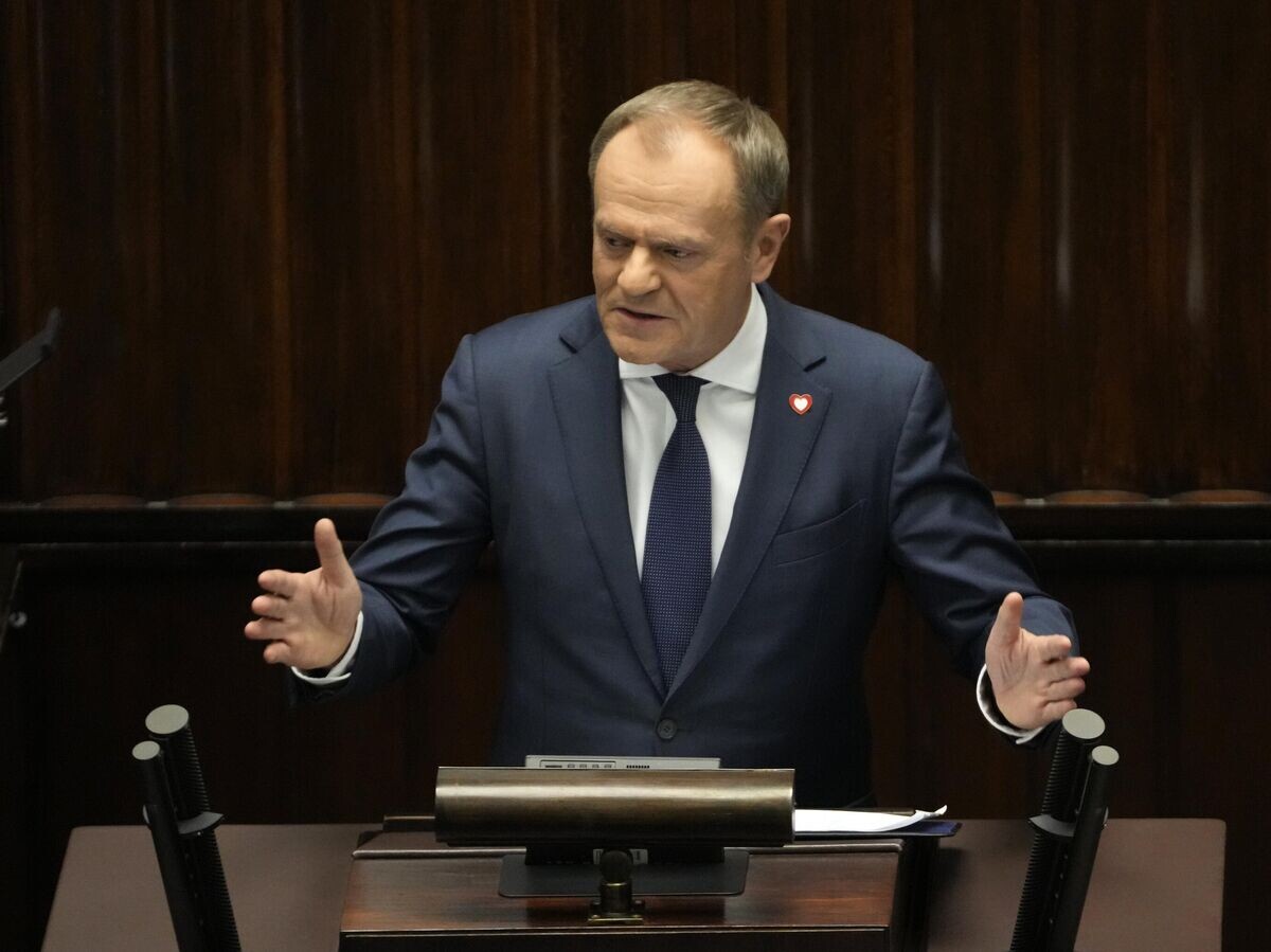    Избранный премьер-министр Польши Дональд Туск во время своего выступления в парламенте© AP Photo / Czarek Sokolowski