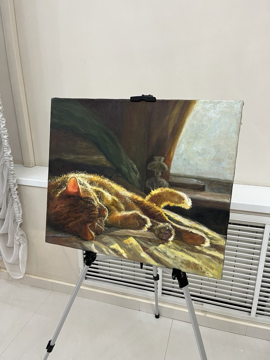 Смотрите, какой милый котик. Прямо наш Рысик в юности. 