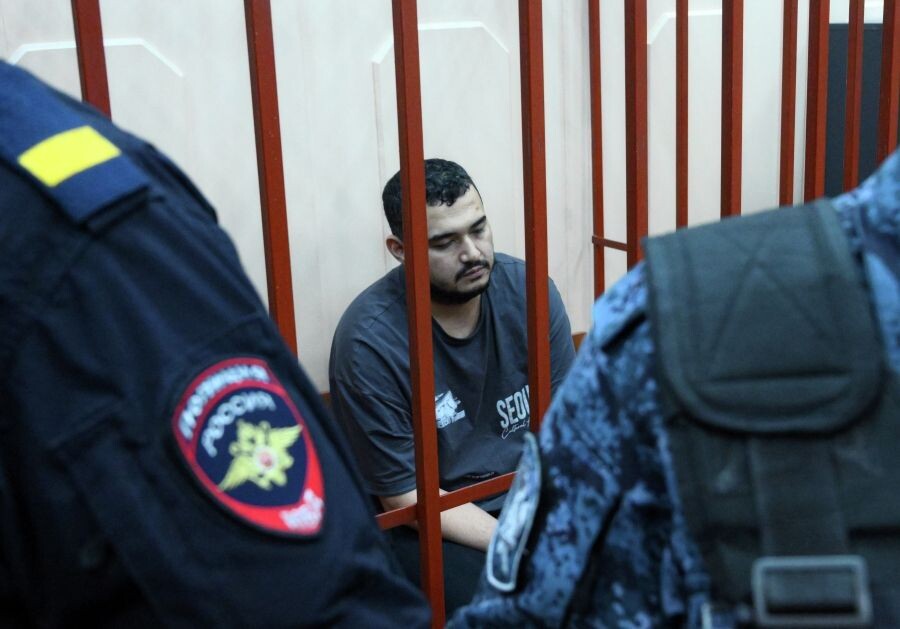    Ахмаджон Курбонов (физическое лицо, внесённое в РФ в перечень террористов и экстремистов) в зале суда / Источник: © Максим Блинов/РИА Новости