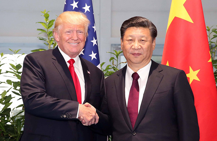    Дональд Трамп и Си Цзиньпин. Архивное фото. Yao Dawe/Imago/TASS