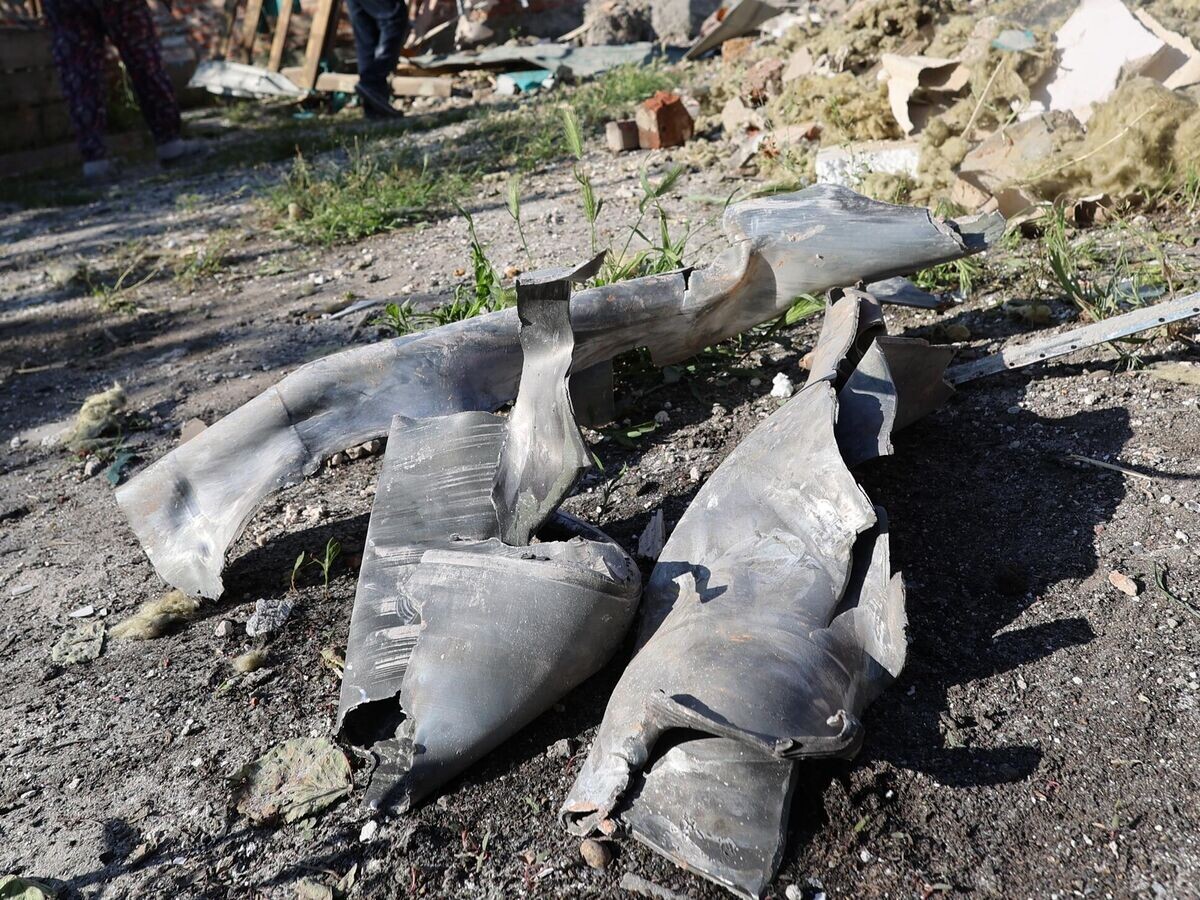    Последствия обстрела Куйбышевского района Донецка© РИА Новости / Сергей Аверин