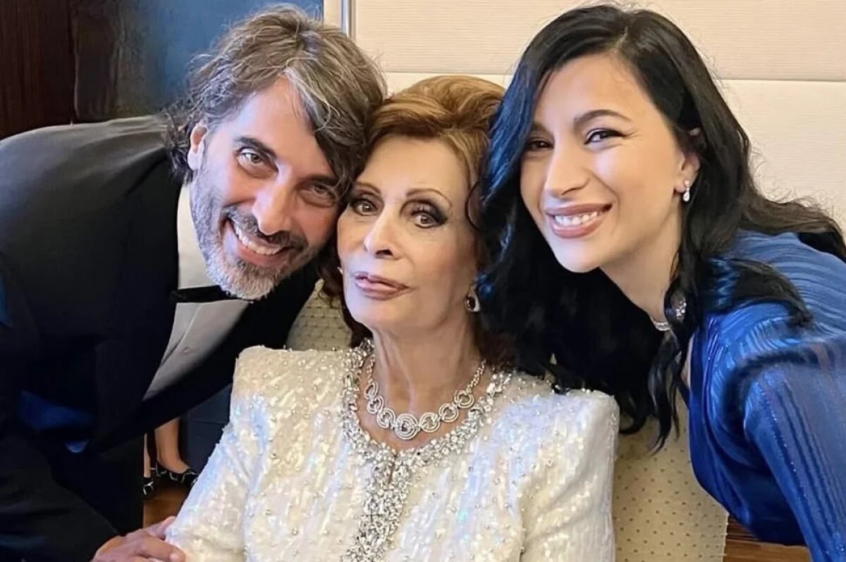    Софи Лорен, Мариам и Карло.