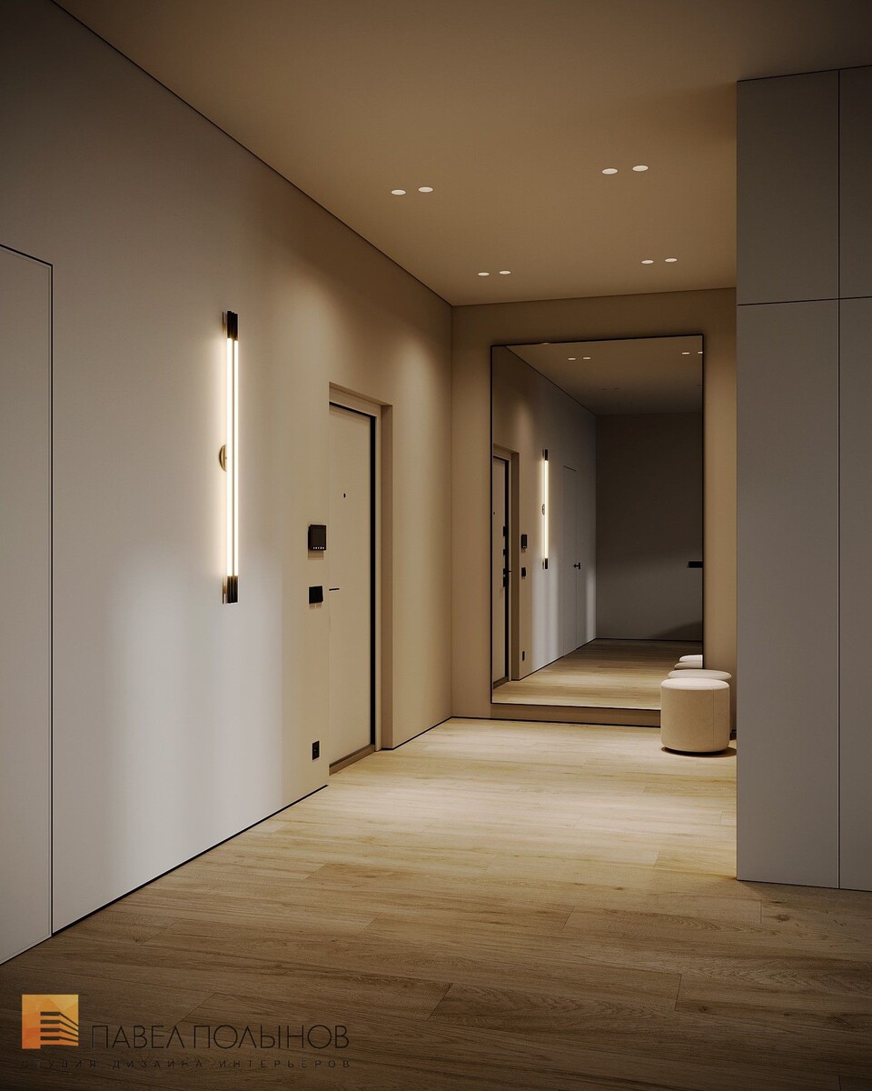 Прихожая — просторное зеркало и тёплый свет создают уют с первых шагов.