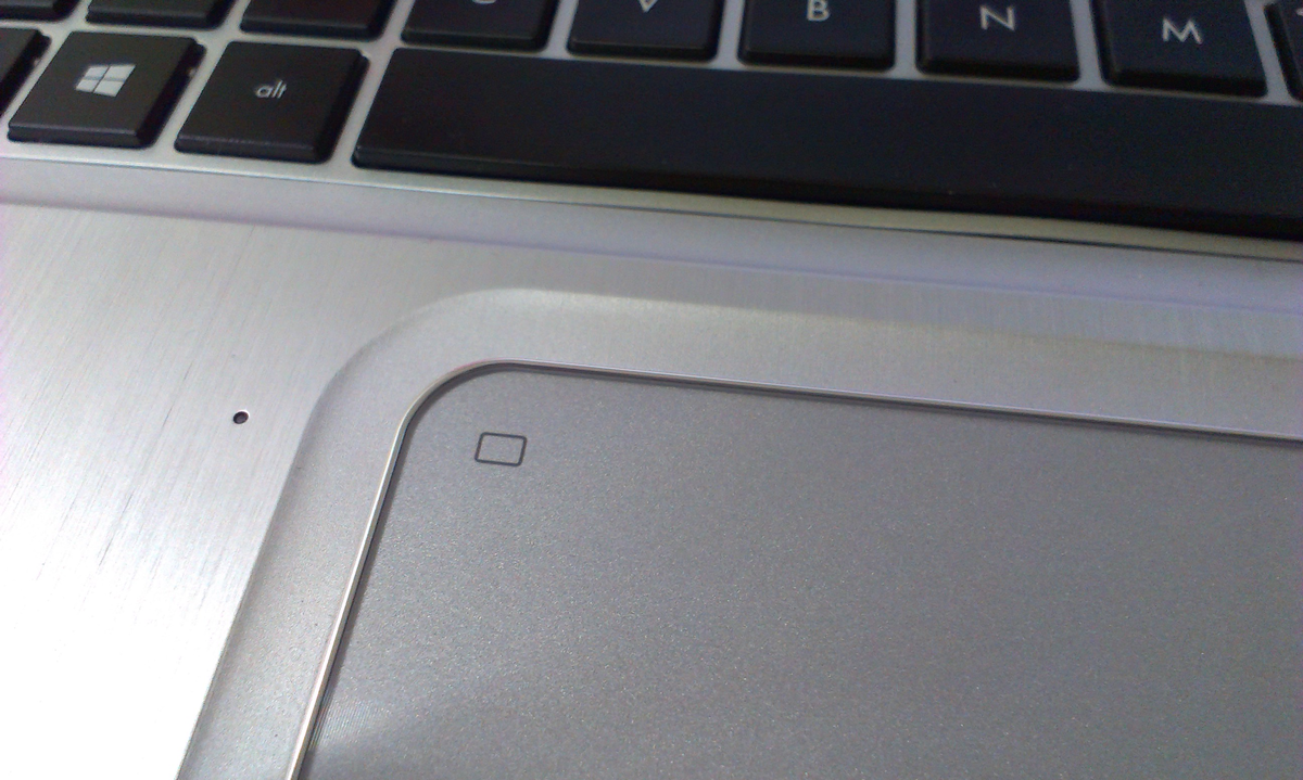 Пример сенсорной кнопки отключения тачпада