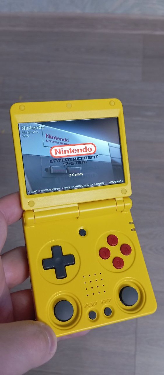 Anbernic RG34XX SP на Knulli OS.