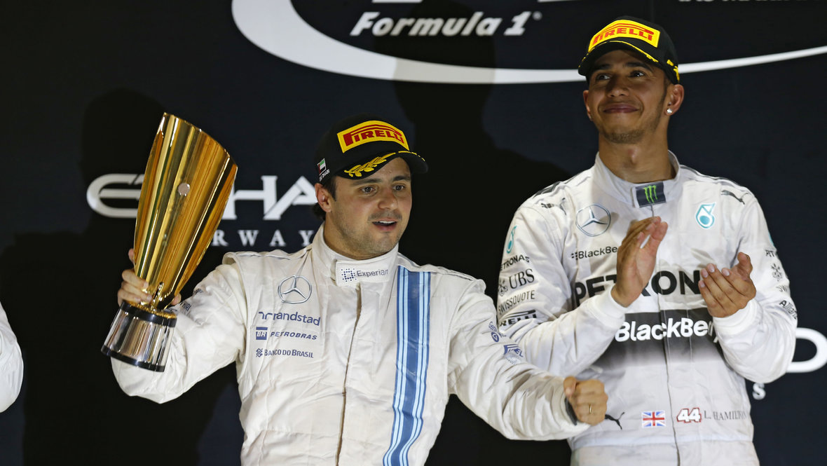    Фелипе Масса и Льюис Хэмилтон на «Гран-при Абу-Даби» в 2014 году. Global Look Press