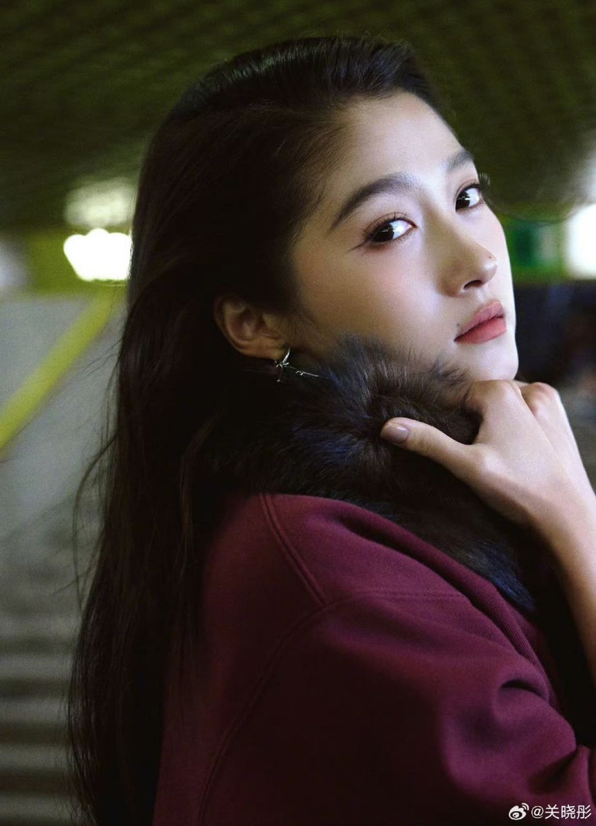 Гуань Сяотун...