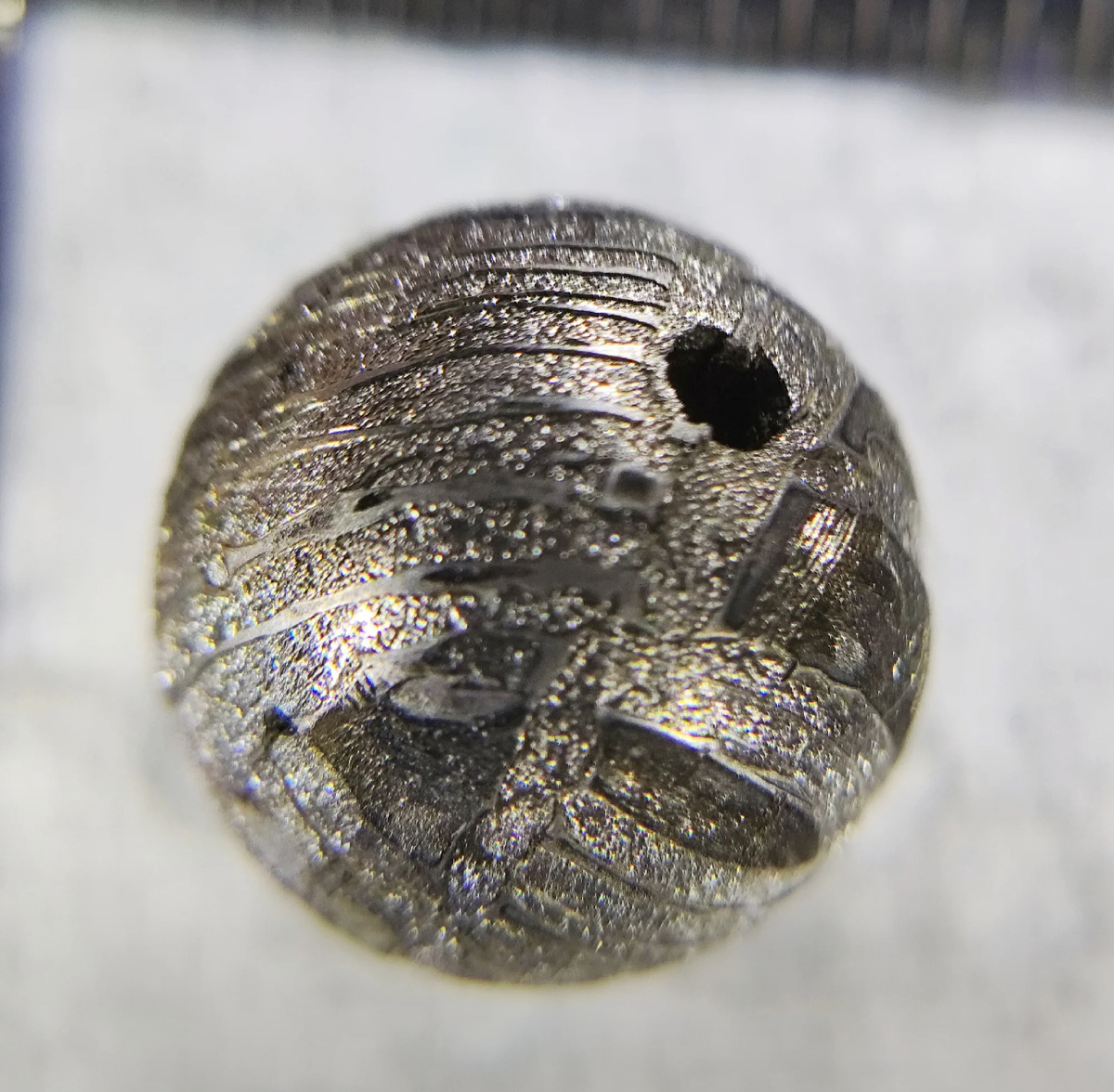 Метеорит бусина