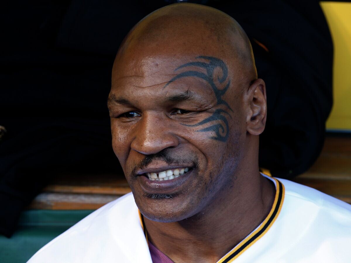    Бывший чемпион в супертяжелом весе Майк Тайсон© AP Photo / Gene J. Puskar