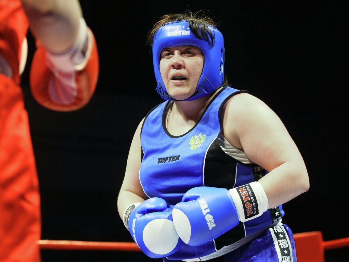    Ирина Синецкая завоевала золото первого в истории женского чемпионата мира, который прошел в 2001 году в США.© РИА Новости / Александр Кряжев