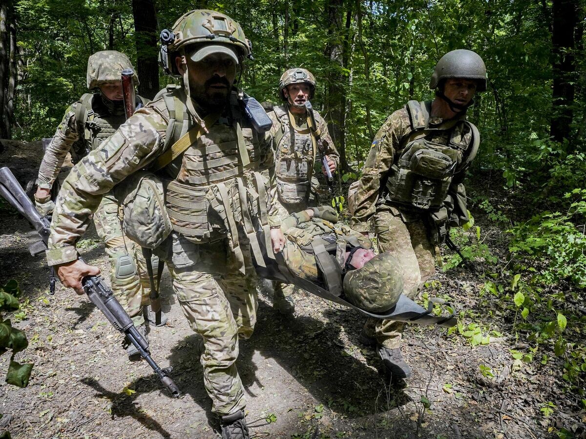    Украинские военнослужащие© AP Photo / Andrii Marienko