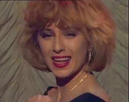 Кадр из клипа группы «Комбинация» на песню «Бухгалтер» 1988 год