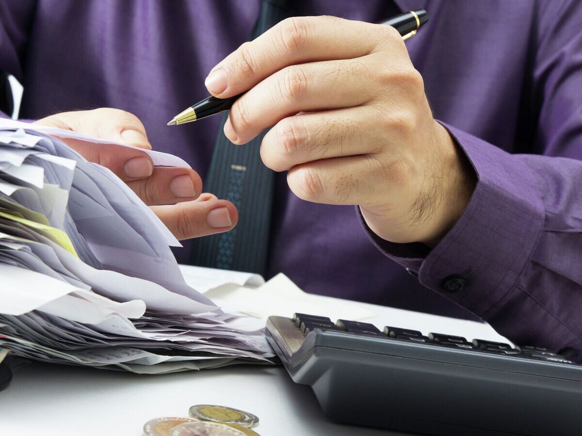    Работа с финансами© Fotolia / patpitchaya