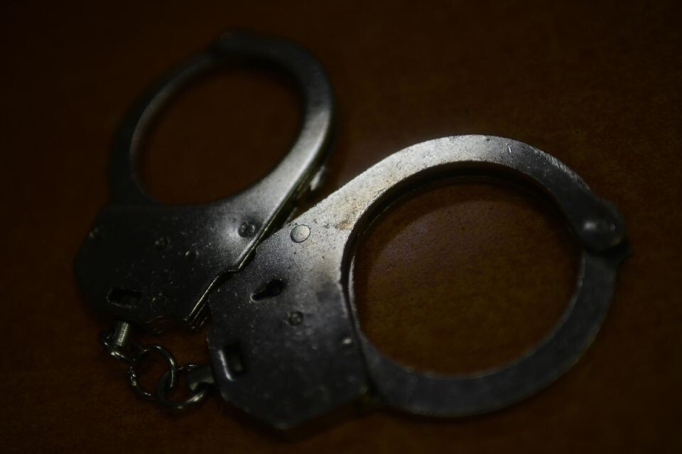    Наручники. Арест.. Источник: media4media.ru