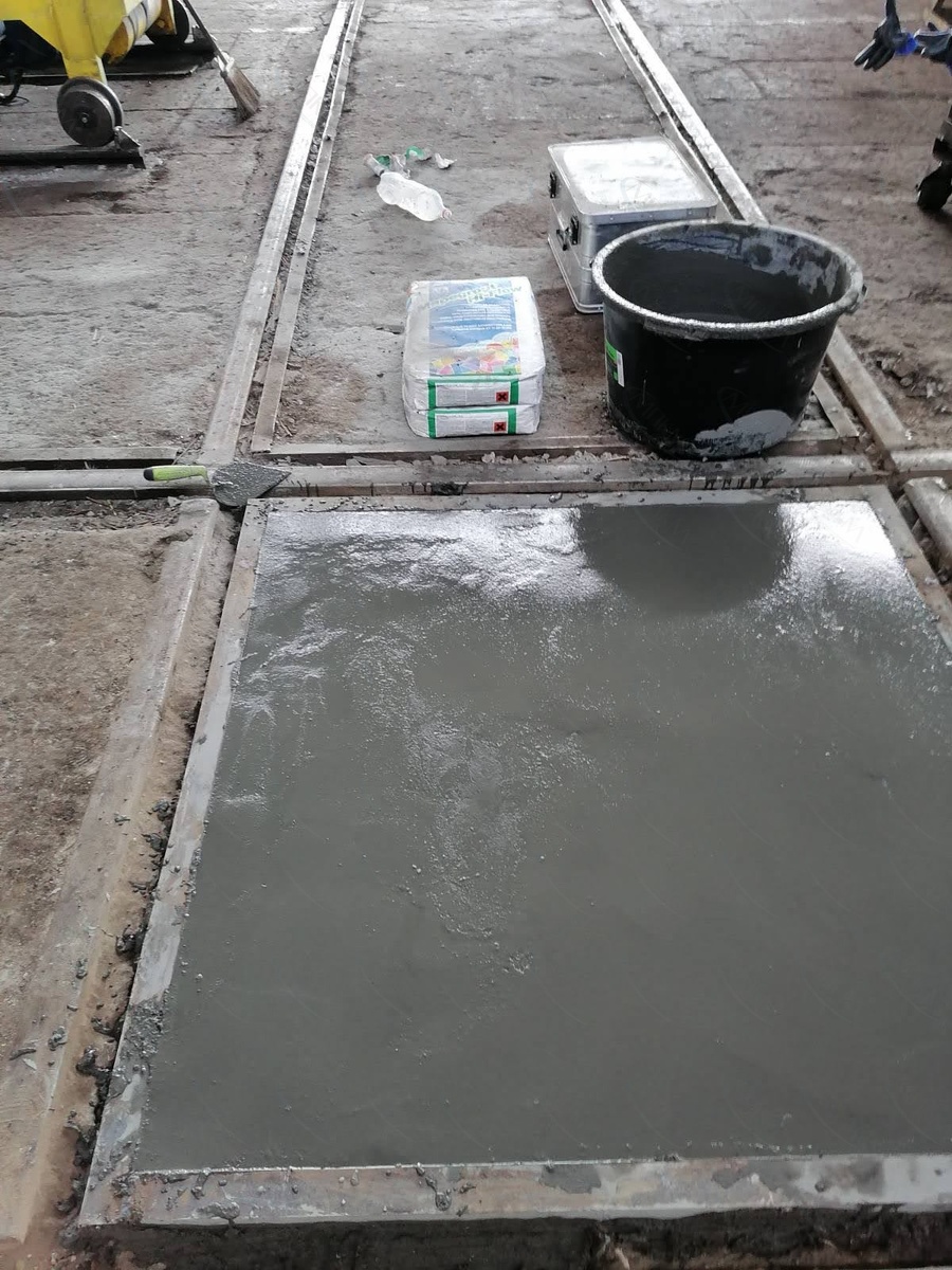 Отремонтированный бетонны пол составами MAPEGROUT