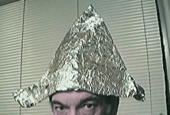 Типичный конспиролог в шапочке из фольги. А шапочка-то у него необычной формы:)