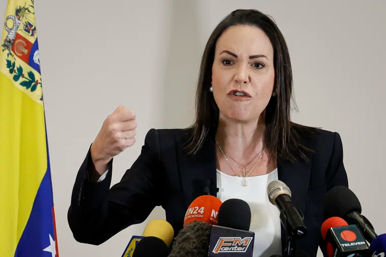 В 2001 году Мачадо вступала в конфронтацию с президентом Уго Чавесом
Фото: Jesus Vargas / dpa / Global Look Press