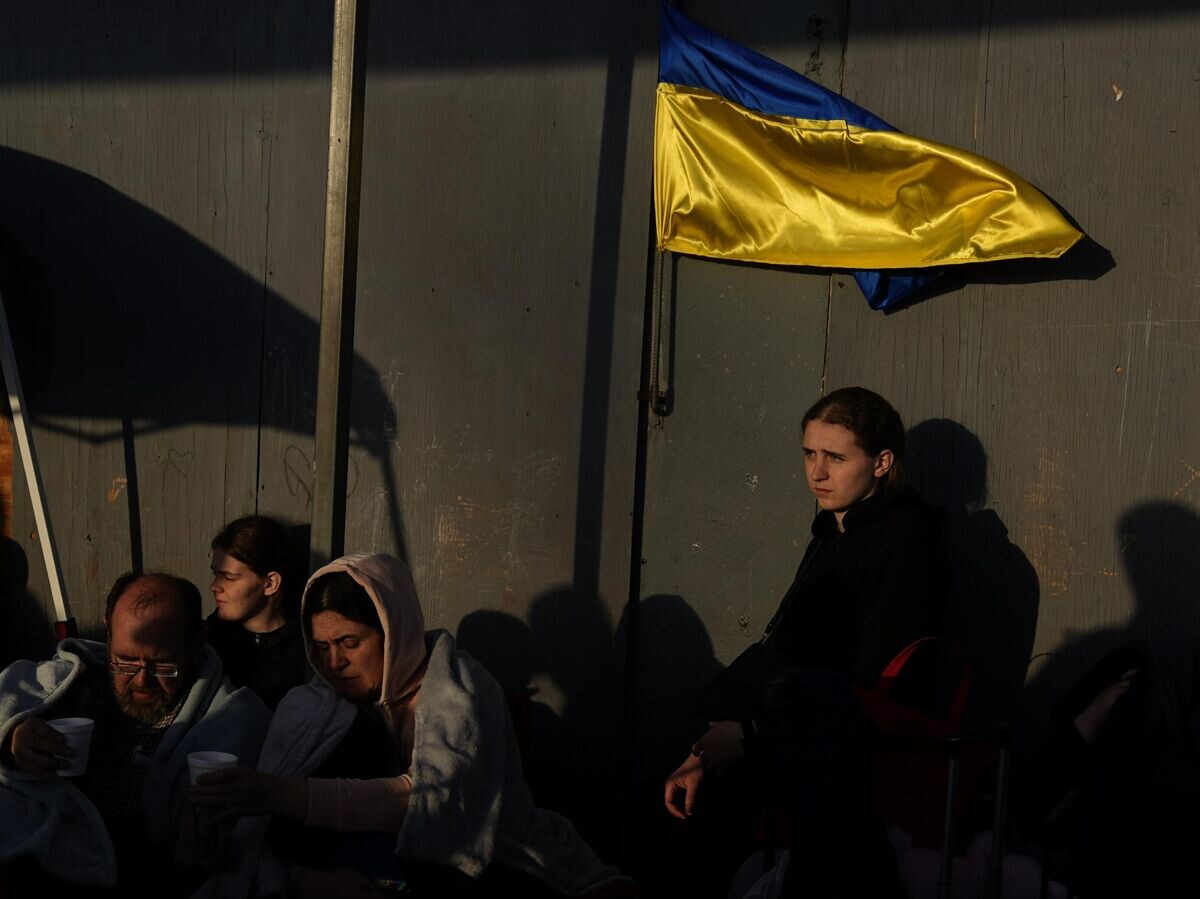    Украинские беженцы© AP Photo / Gregory Bull