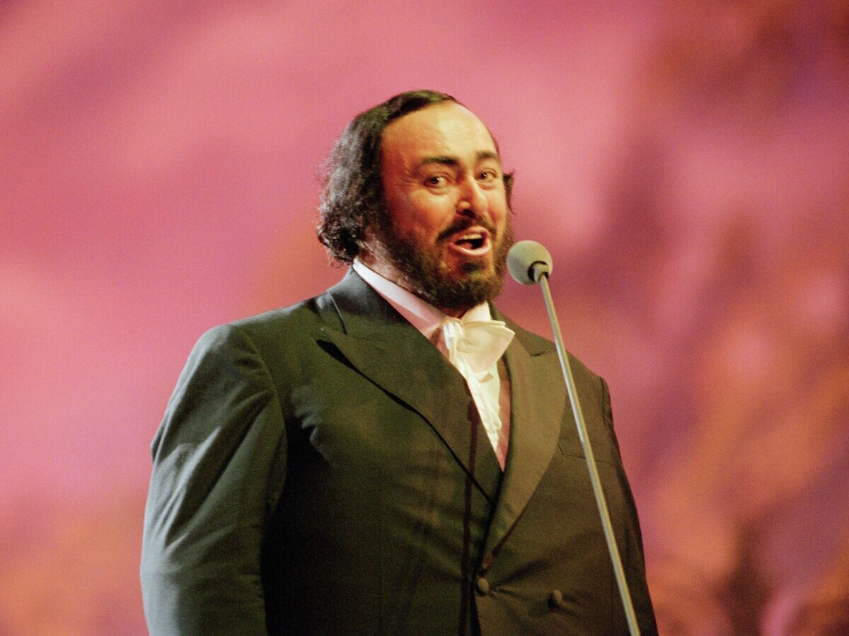    Лучано Паваротти во время концерта в Модене© Getty Images / Brian Rasic