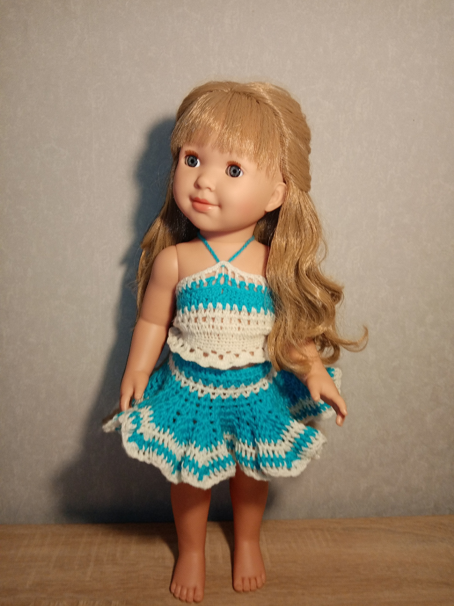 Куколка мне очень нравится так скажем у души, волосы вьются, можно делать разные прически