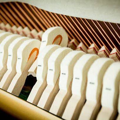 Механизм внутри рояля