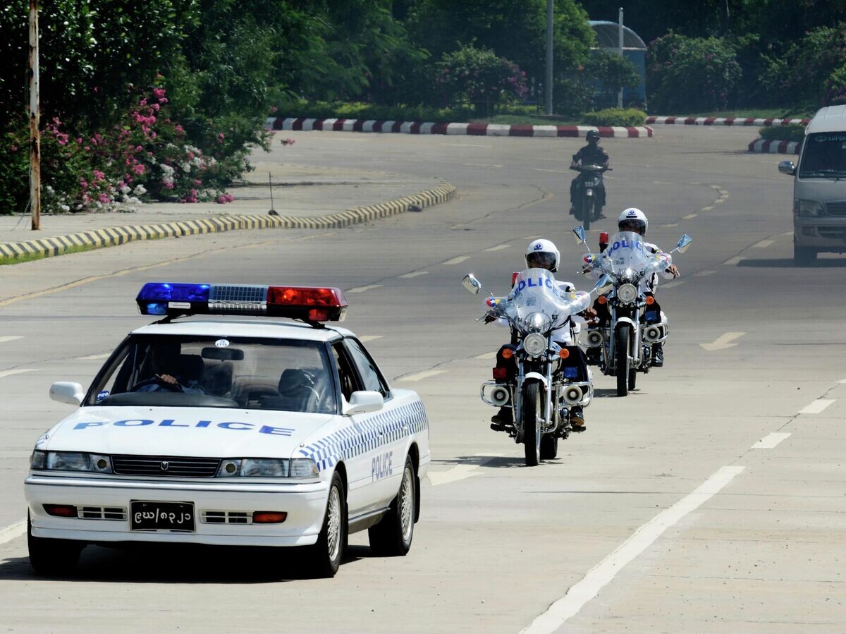    Автомобиль полиции в Мьянме© Getty Images / Thierry Falise