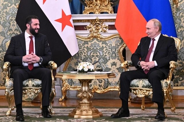    Владимир Путин и Ахмед аш-Шараа. Фото: kremlin.ru/ Сергей Бобылев, ТАСС