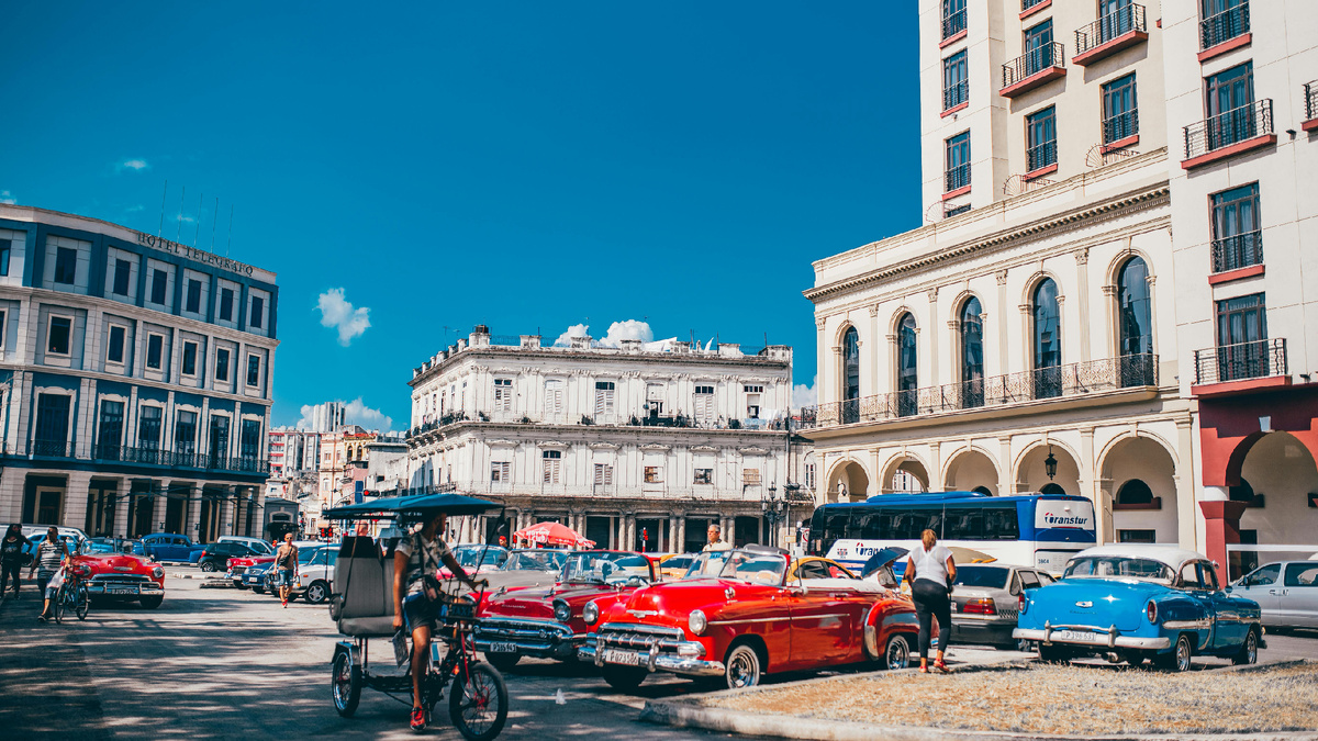 Photo by Yuting Gao: https://www.pexels.com/photo/parked-vehicles-near-building-1637118/