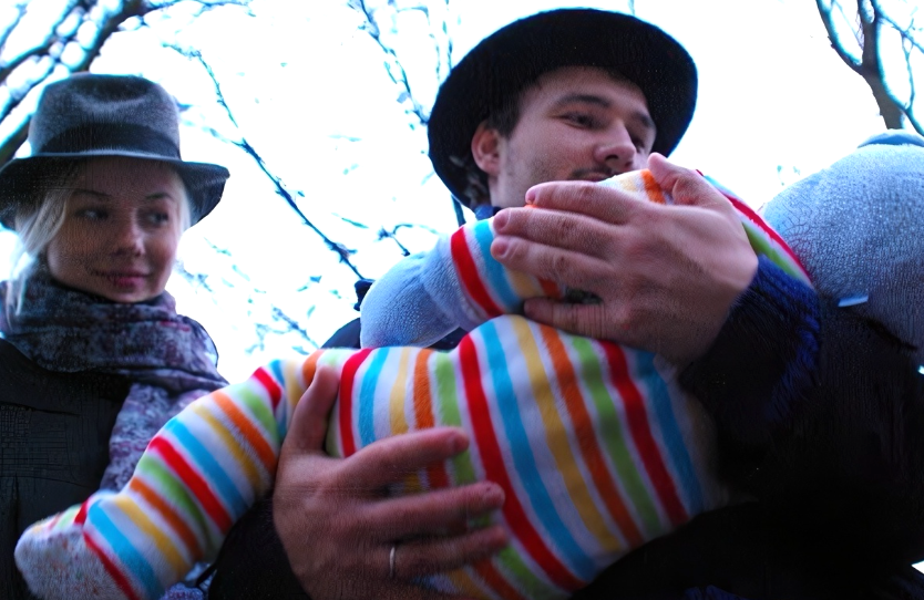 на фото Елена Аросьева и Дмитрий Аросьев с сыном