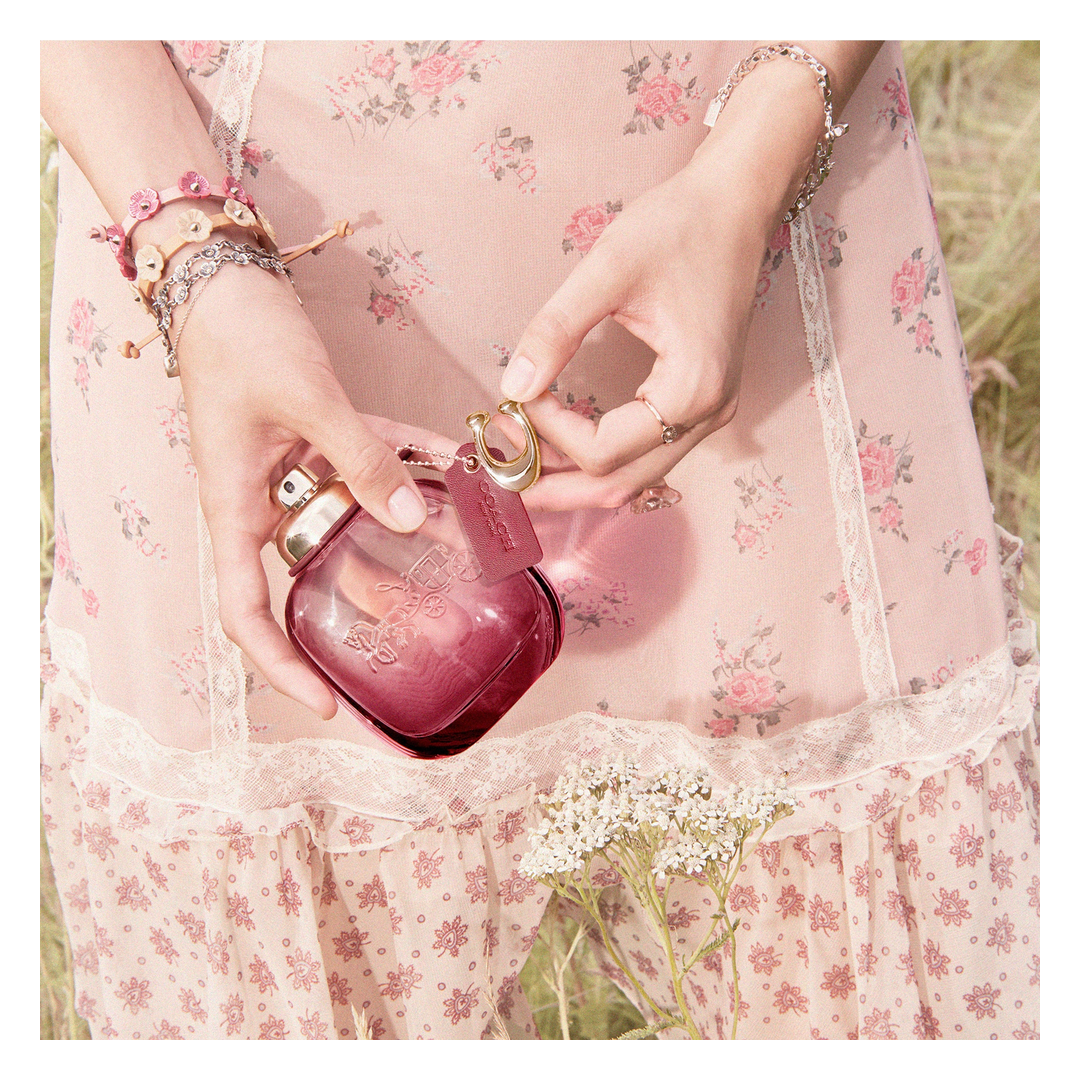 Реклама аромата Coach Wild Rose