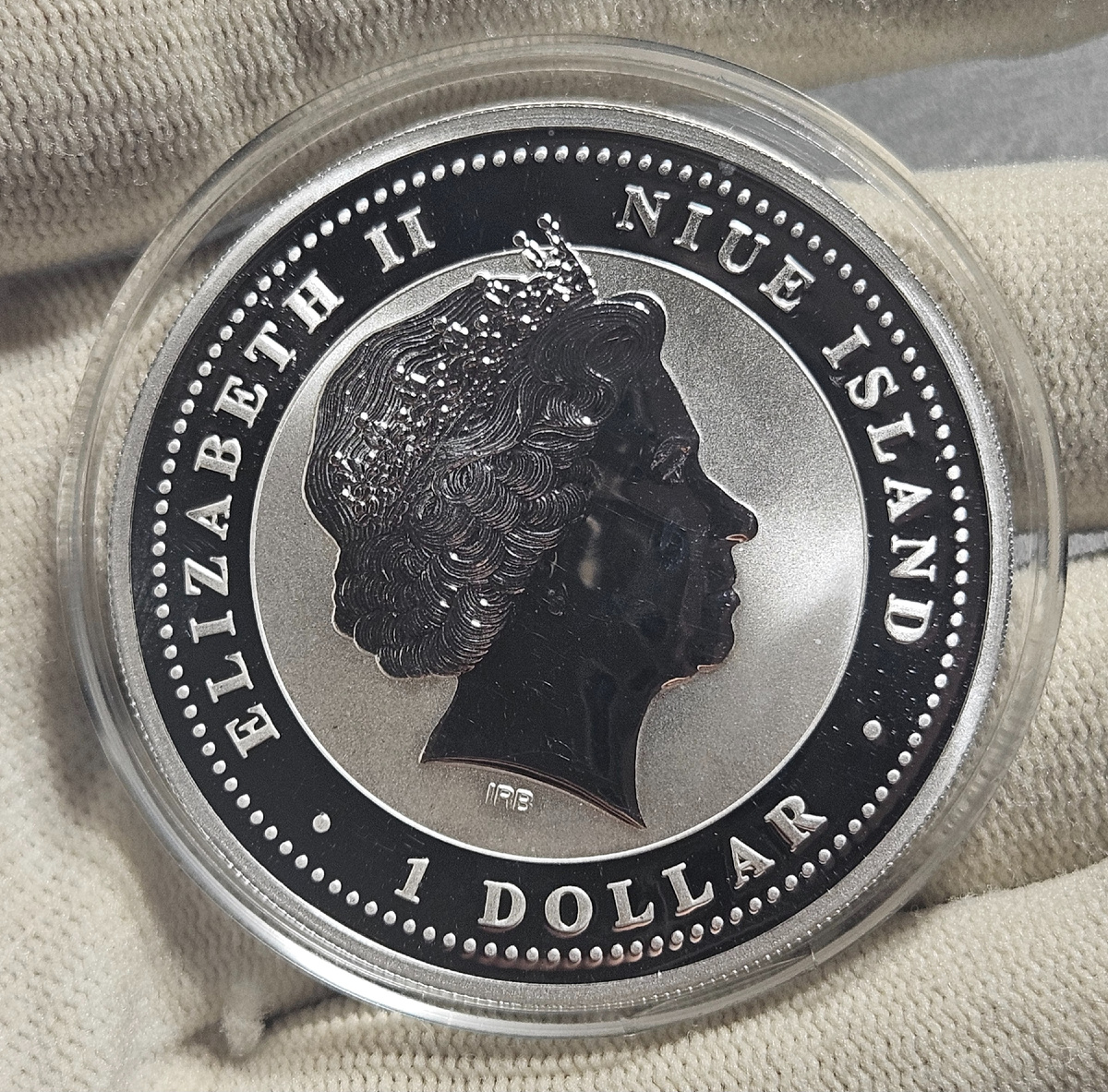 Реверс инвистиционной монеты НИУЭ 