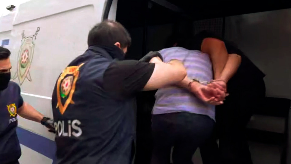   Скриншот оперативной сьемки задержания Игоря Картавых и Евгения Белоусова