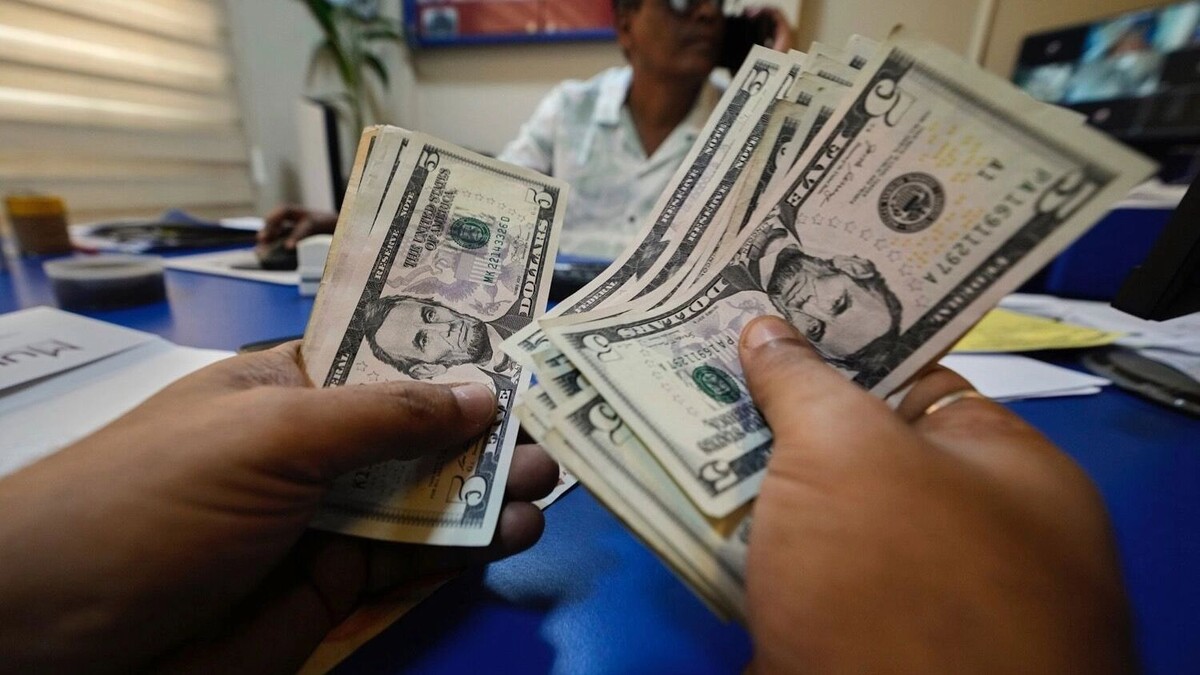 Фото: AP/TASS. Доля расчета за российскую нефть в долларах сокращается