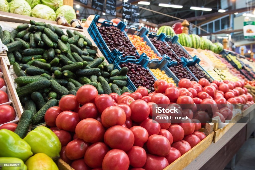    Vegetable farmer market counter: colorful various fresh organic healthy vegetables at grocery store. Healthy natural food concept Редакция газеты