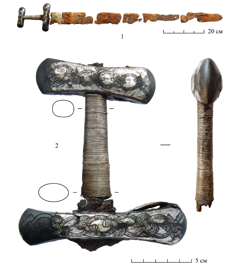 Меч из кургана Нюбиничи 10 после реставрации: 1 – общий вид; 2 – рукоять.