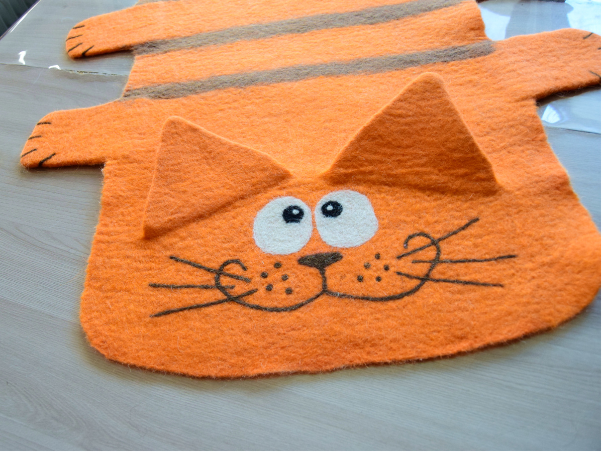 Валяный коврик ручной работы